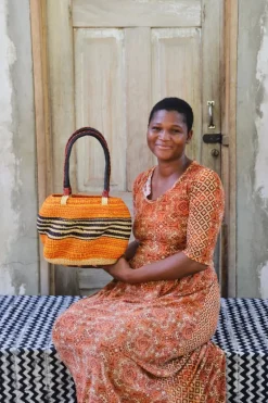 Stay Flow Deluxe Woven Handbag (Large) by Mary Ayinbora